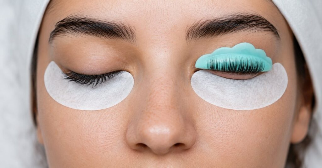 Lash lift and tint treatment in progress with a silicone shield and under-eye gel patches.